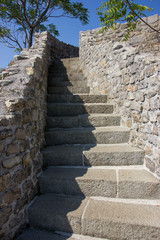 Fototapeta na wymiar Stone stairway in the old town Budva.