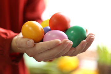 Female hands holding Easter eggs