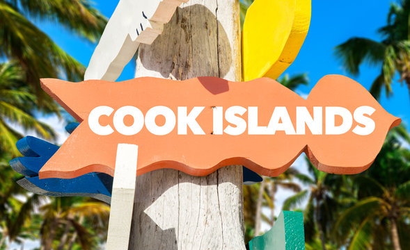 Cook Islands Signpost With Palm Trees