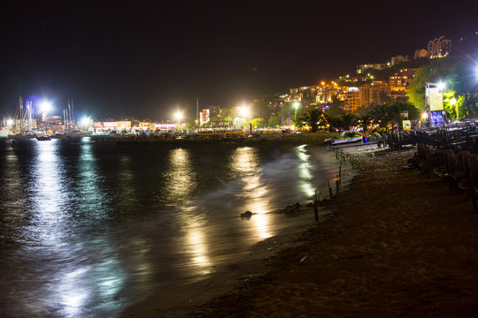 Night view on the beach of the town Budva.