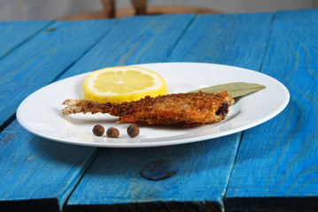 fried fish with lemon