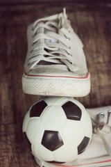 White sneakers and football