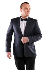 Businessman isolated over white background, smiling.