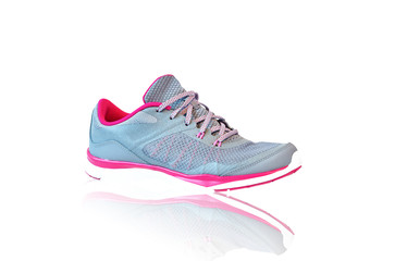 New unbranded running shoe, sneaker or trainer isolated on white background with reflection