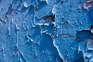 Old peeling blue paint 