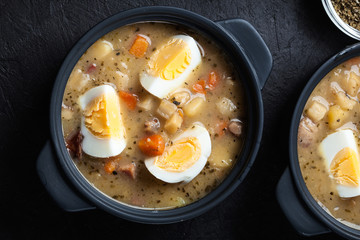 The sour soup made of rye flour with eggs