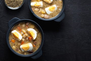 The sour soup made of rye flour with eggs