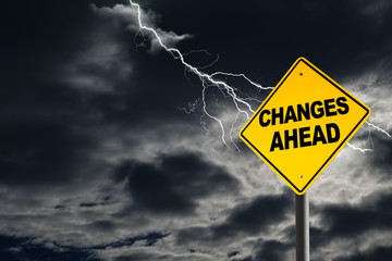 Changes Ahead Sign With Stormy Background. Concept of situation changing for the worse.