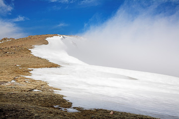 Mountain cowered snow and cloud