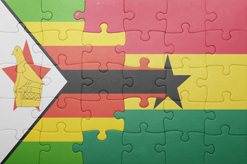 puzzle with the national flag of ghana and zimbabwe
