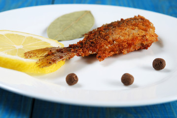 fried fish with lemon