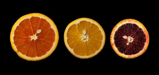 Three orange slices: red, yellow, ruby