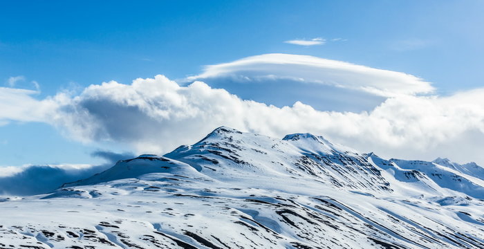 Clouds flowing over Arctic mountains