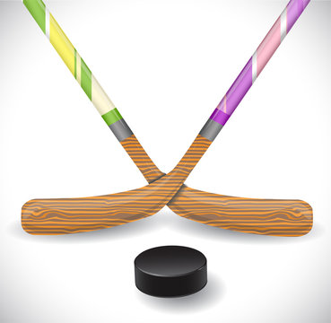 Hockey sticks and hockey puck. Illustration 10 version