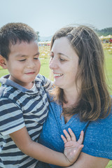 Mother and son outdoors