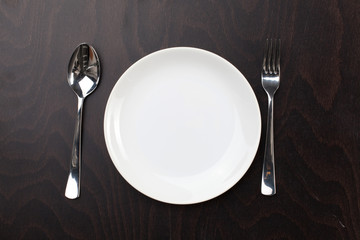 table setting. plate fork knife white empty