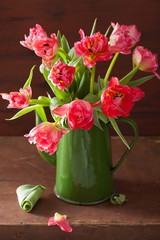 beautiful pink tulip flowers bouquet in green pot