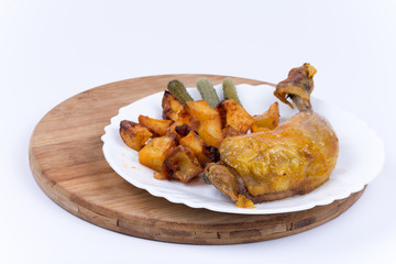 Roasted thighs and drumsticks with potatoes