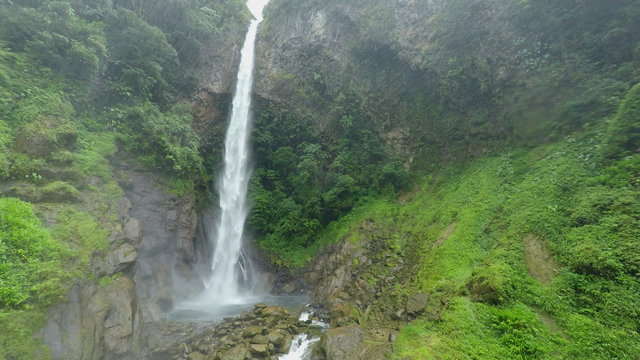 Capture the stunning beauty of Machay Waterfall's upper part in a mesmerizing static shot for a truly immersive experience.