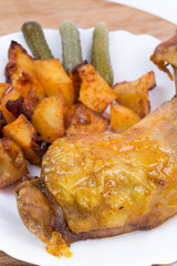 Roasted thighs and drumsticks with potatoes