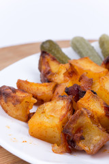 Roasted potatoes in the plate