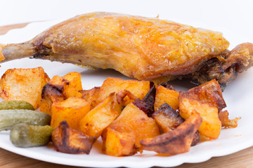 Roasted chicken meat with potatoes