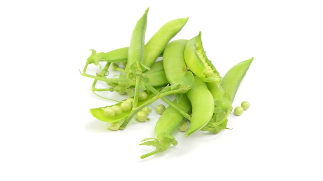 raw green fresh  peas on white background