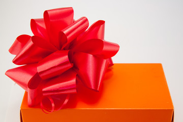 orange box with red bow