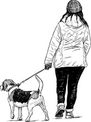 woman with her dog on a walk