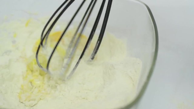 Whisking egg flour and milk