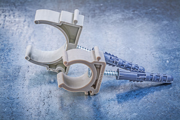 Pipe faucets on metallic background horizontal view construction