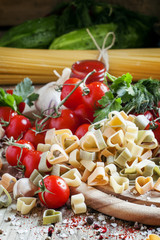 Dry pasta, three-colored hearts, vegetables and seasoning, selec