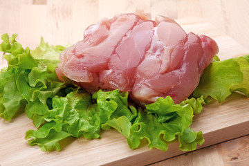 fresh chicken with vegetables on the kitchen table