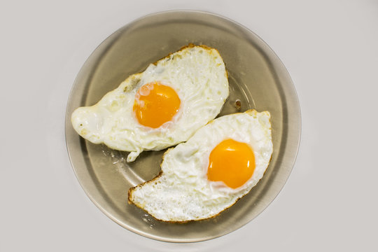 Cooked  eggs on glass plate 