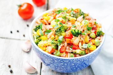 broccoli, corn, red pepper, green peas red and white rice