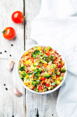 broccoli, corn, red pepper, green peas red and white rice