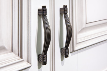 silver handles on cabinet doors
