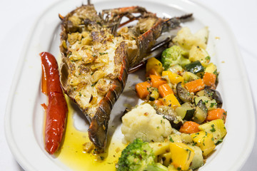 delicious lobster tail served on plate, close up shot