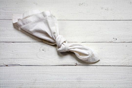 Reminder, Knot In An Old  Handkerchief On White Painted Wood