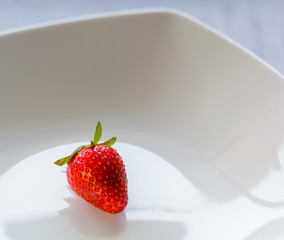 Red and fresh Strawberry on white background
