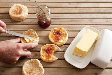 English muffins with butter and jelly spread