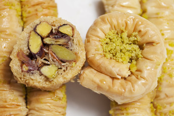 Delicious arranged baklava topped with pistachios 