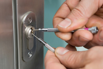 Lockpicker Fixing Door Handle At Home