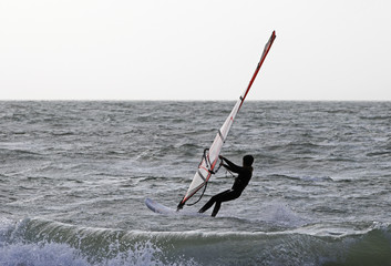 Wind Surfer on a windy stormy day