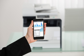 Businesswoman Hand Giving Print Command On Smart Phone