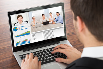 Businessman Video Conferencing On Laptop