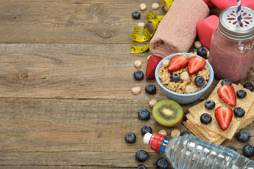 Items for sports on a wooden background