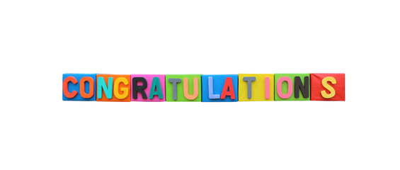 The colorful font of congratulation on paper box isolated on whi