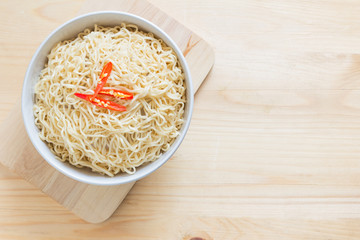 Instant noodles boiled  on wood table background