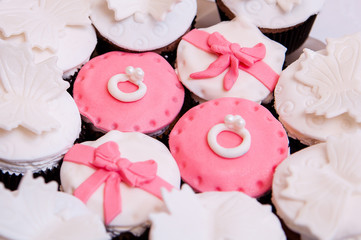 cupcake with flowers and rings